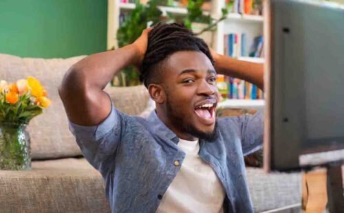 Man wondering why tv display is upside down