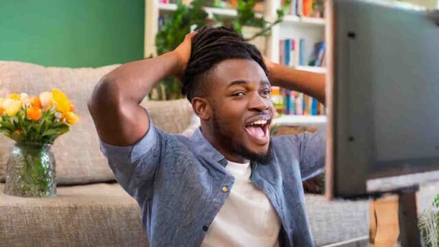 Man wondering why tv display is upside down
